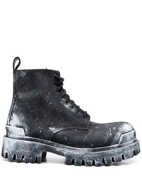 balenciaga paint splatter boots.